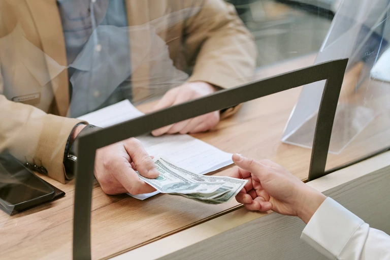 customer withdrawing cash at ACE