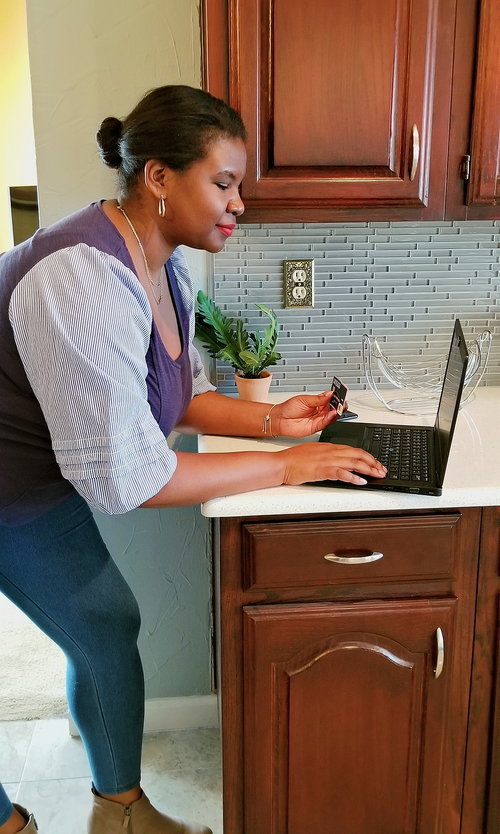 Ashli manages her A, B, C, D accounts online