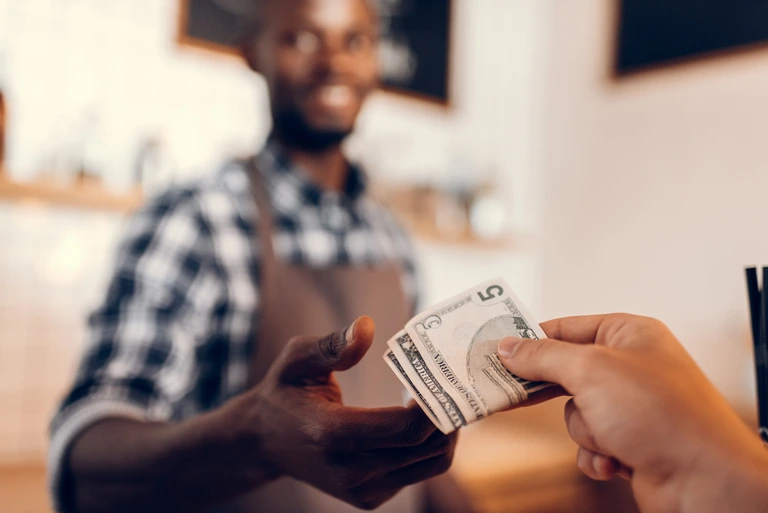 customer paying with cash customer paying with cash