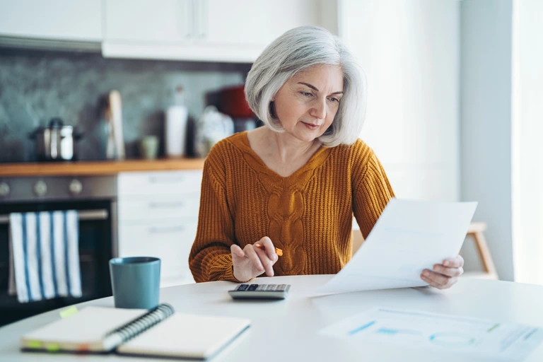 woman doing her taxes woman doing her taxes