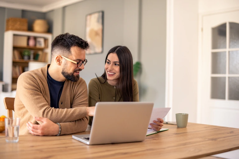 couple creating a budget together couple creating a budget together