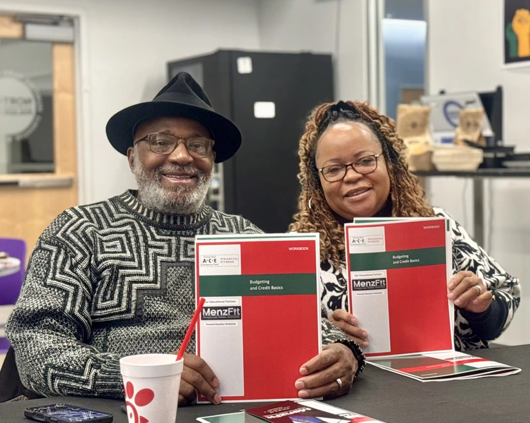 MenzFit financial literacy class attendees smiling MenzFit financial literacy class attendees smiling