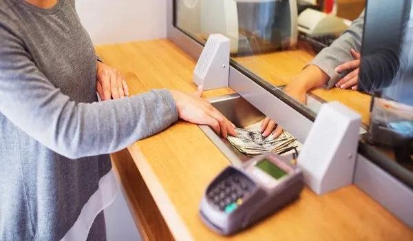 person purchasing a money order with cash
