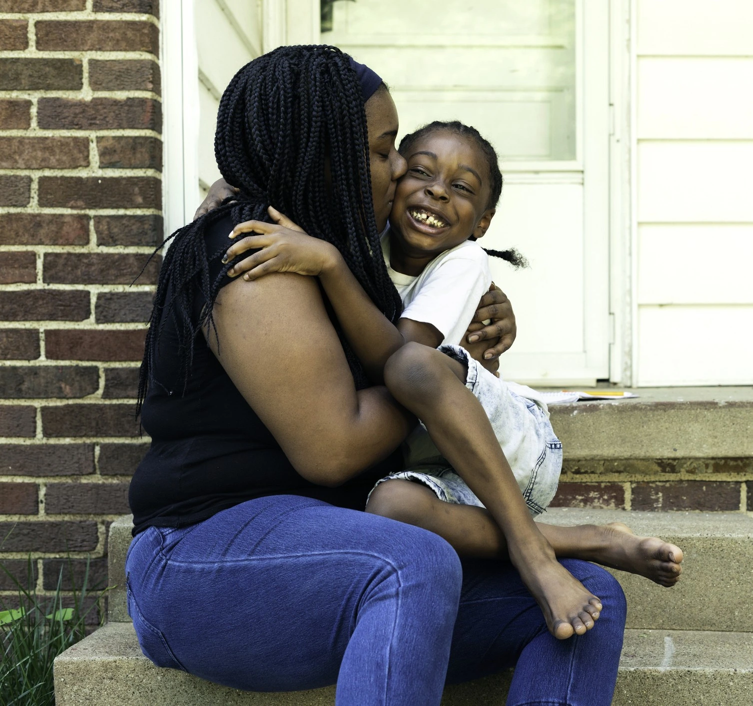 happy family after getting approved for a loan