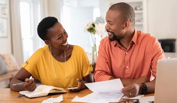 a couple doing their taxes